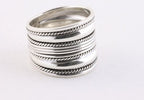 Brede zilveren ring met ribbels en kabelpatronen afbeelding 1