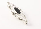 Langwerpige opengewerkte zilveren broche met onyx en marcasiet afbeelding 1