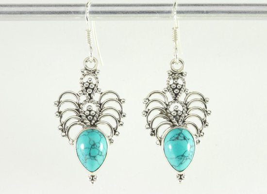 Opengewerkte zilveren oorbellen met turkoois afbeelding 4