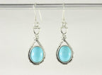 Geknoopte zilveren oorbellen met Arizona turkoois afbeelding 4