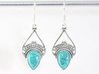 Opengewerkte zilveren oorbellen met turkoois afbeelding 4