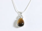 Zilveren hanger met tijgeroog en witte topaas aan ketting afbeelding 5
