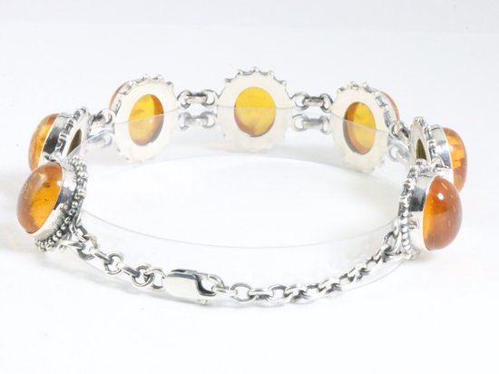 Zware bewerkte zilveren armband met amber afbeelding 2