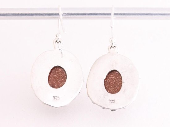 Bewerkte zilveren oorbellen met goudsteen afbeelding 3