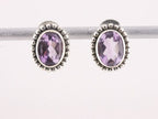 Bewerkte zilveren oorstekers met amethist afbeelding 1