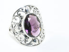 Opengewerkte zilveren ring met amethist afbeelding 1