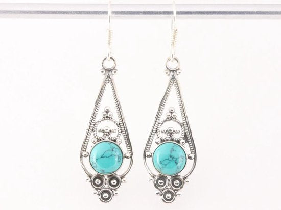 Lange opengewerkte zilveren oorbellen met turkoois afbeelding 4