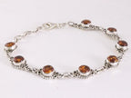 Bewerkte zilveren schakelarmband met amber afbeelding 2