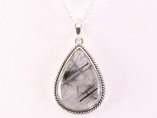 Bewerkte zilveren hanger met grote zwarte rutielkwarts aan ketting afbeelding 4