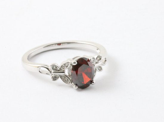 Hoogglans zilveren ring met granaat en witte topaas afbeelding 1