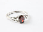 Hoogglans zilveren ring met granaat en witte topaas afbeelding 1