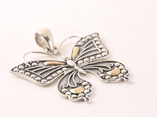 Grote zilveren vlinder hanger met 18k gouden decoraties afbeelding 2