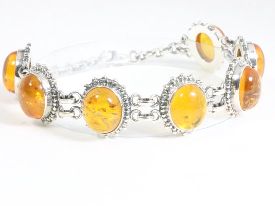 Zware bewerkte zilveren armband met amber afbeelding 1