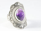 Bewerkte zilveren ring met amethist afbeelding 1