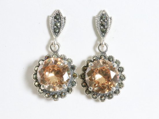 Ronde zilveren oorstekers met citrien en marcasiet afbeelding 1