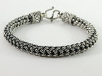 Zware ronde gevlochten zilveren armband afbeelding 1