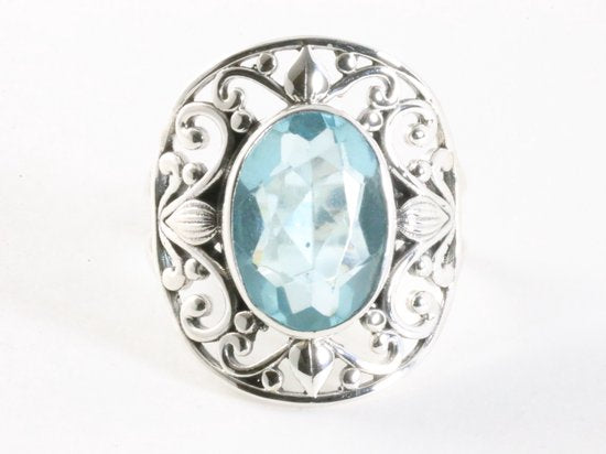 Opengewerkte zilveren ring met blauwe topaas afbeelding 4