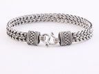 Gevlochten zilveren armband met bewerkte sluiting afbeelding 1