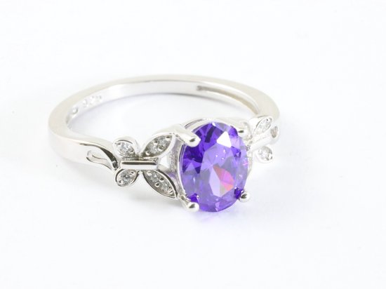 Hoogglans zilveren ring met blauwe saffier en witte topaas afbeelding 1