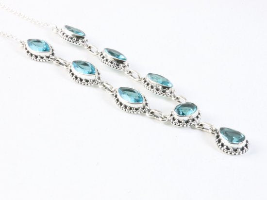 Bewerkte zilveren ketting met blauwe topaas afbeelding 2