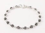 Fijne zilveren armband met roosjes afbeelding 1