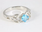 Opengewerkte hoogglans zilveren ring met aquamarijn afbeelding 1