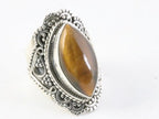 Zware bewerkte zilveren ring met tijgeroog afbeelding 1