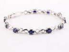 Zilveren tennisarmband met blauwe saffier afbeelding 2