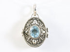 Traditioneel bewerkt zilveren medaillon met blauwe topaas afbeelding 4