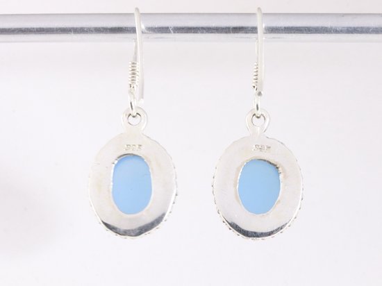 Bewerkte ovale zilveren oorbellen met blauwe chalcedoon afbeelding 3