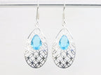 Opengewerkte zilveren oorbellen met blauwe topaas afbeelding 1