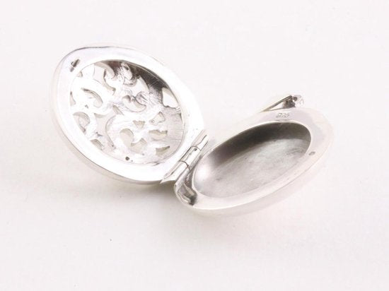 Rond opengewerkt zilveren medaillon afbeelding 5