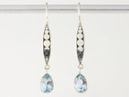 Lange bewerkte zilveren oorbellen met blauwe topaas afbeelding 4