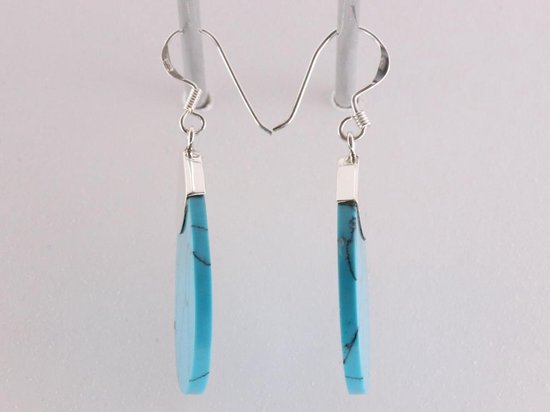 Grote druppelvormige zilveren oorbellen met blauwe turkoois afbeelding 2