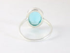 Ovale hoogglans zilveren ring met blauwe topaas afbeelding 3