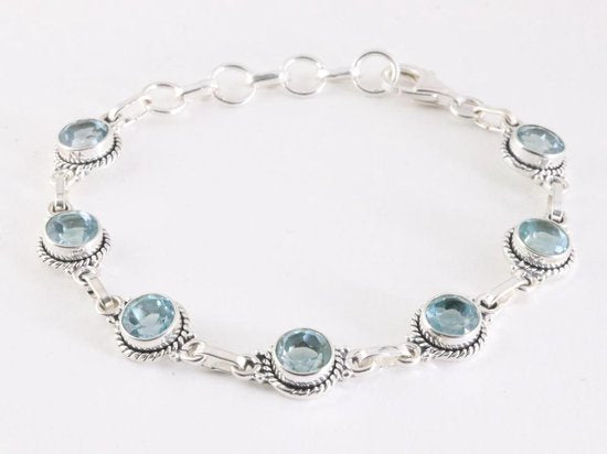Bewerkte zilveren schakelarmband met blauwe topaas afbeelding 1
