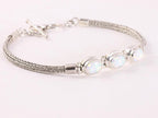 Traditionele zilveren snake armband met welo opaal afbeelding 2