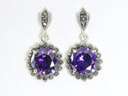 Ronde zilveren oorstekers met amethist en marcasiet afbeelding 1