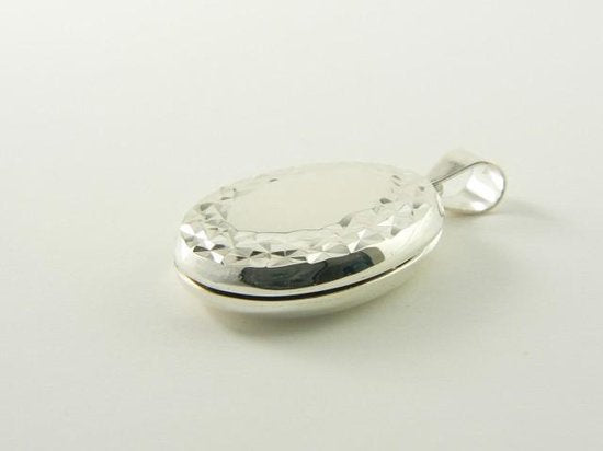 Gehamerd zilveren medaillon voor twee foto's afbeelding 2