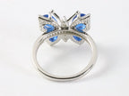 Hoogglans zilveren vlinder ring met blauwe saffier en witte topaas afbeelding 3