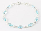 Fijne zilveren armband met blauwe topaas afbeelding 1