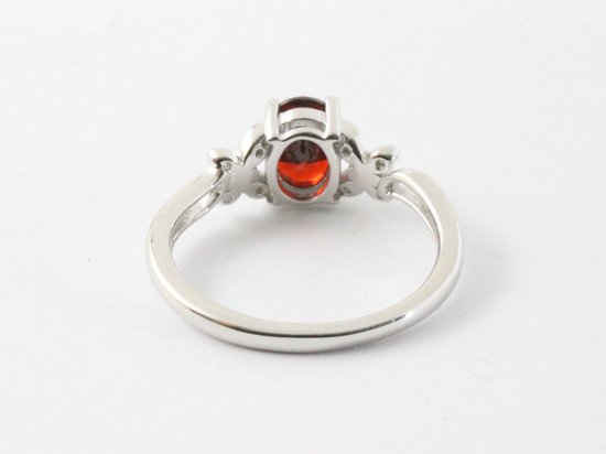 Hoogglans zilveren ring met granaat en witte topaas afbeelding 3