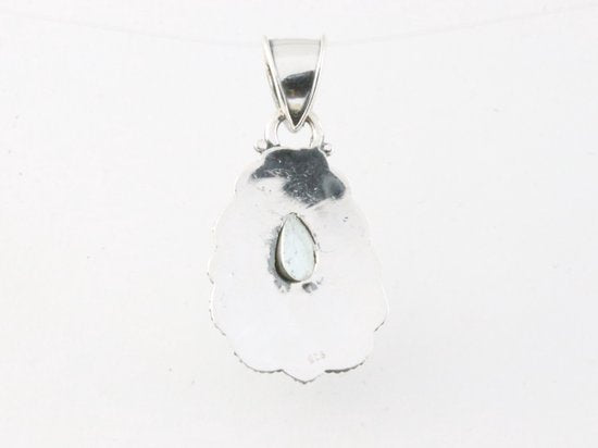 Traditionele bewerkte zilveren hanger met blauwe topaas afbeelding 3