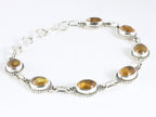 Bewerkte zilveren armband met amber afbeelding 2