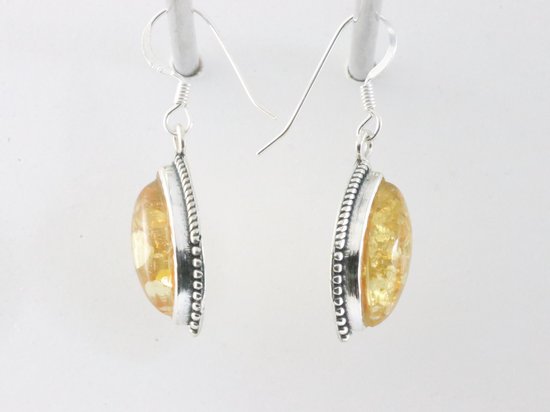 Bewerkte zilveren oorbellen met amber afbeelding 2