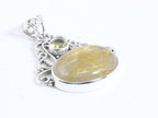Opengewerkte zilveren hanger met gouden rutielkwarts en citrien afbeelding 2