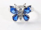 Hoogglans zilveren vlinder ring met blauwe saffier en witte topaas afbeelding 4