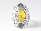 Bewerkte zilveren ring met amber afbeelding 4
