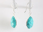 Druppelvormige zilveren oorbellen met gefacetteerde turkoois afbeelding 2