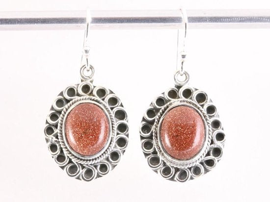 Bewerkte zilveren oorbellen met goudsteen afbeelding 1